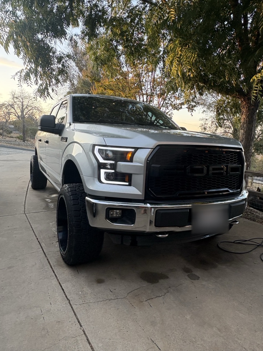 Silver Ford F-150 with clean paint and wheels