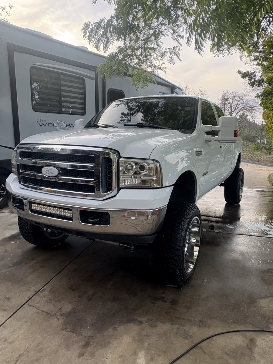 White Ford F-250 Super Duty with clean, glossy paint